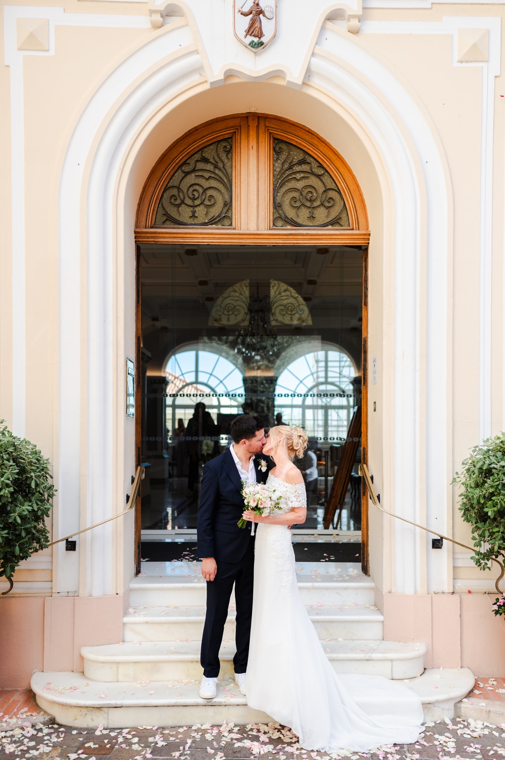 Wedding couple in front of Monaco City Hall photographed by Monaco wedding photographer