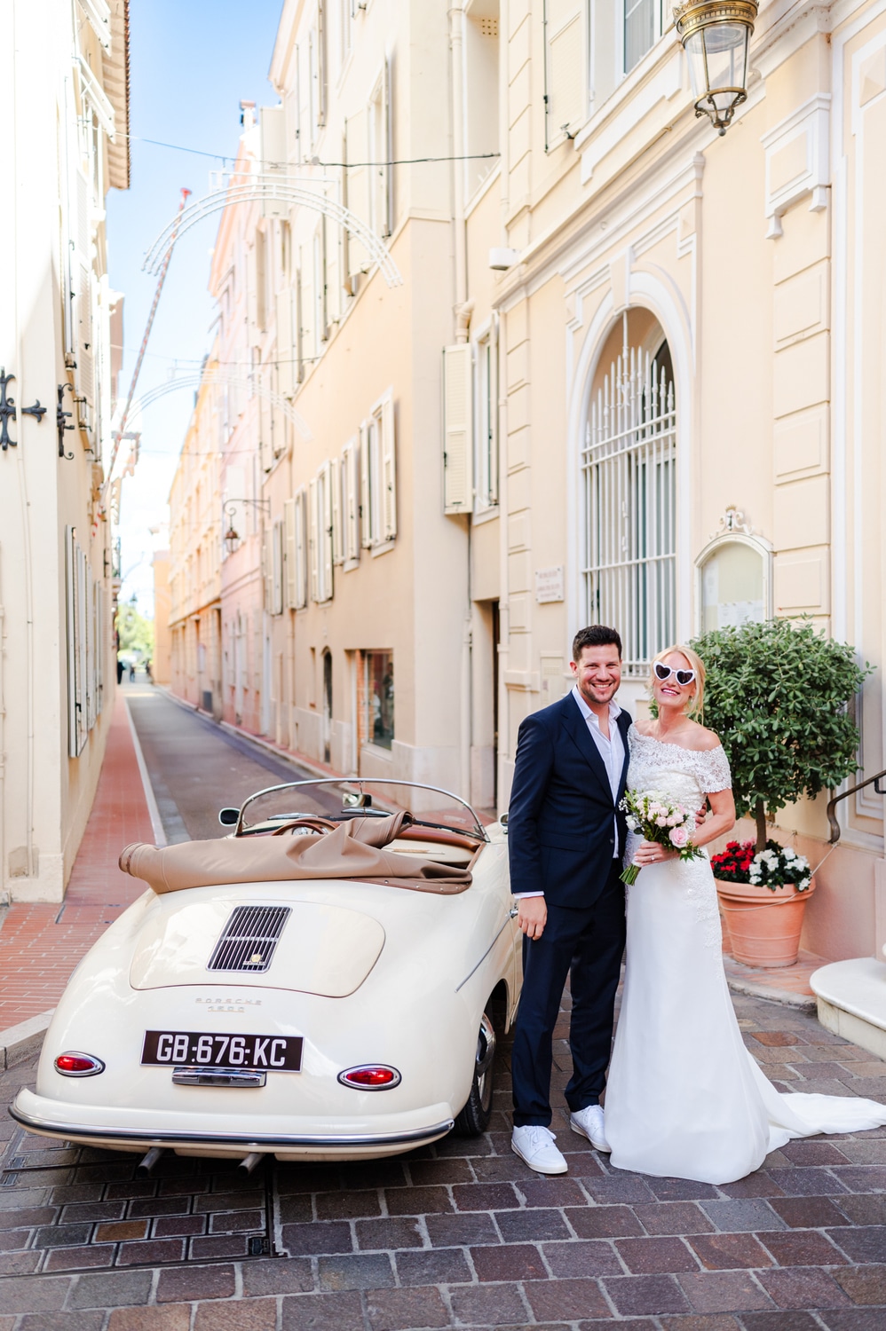 Monaco wedding couple with vintage Porsche Speedster on the Riviera